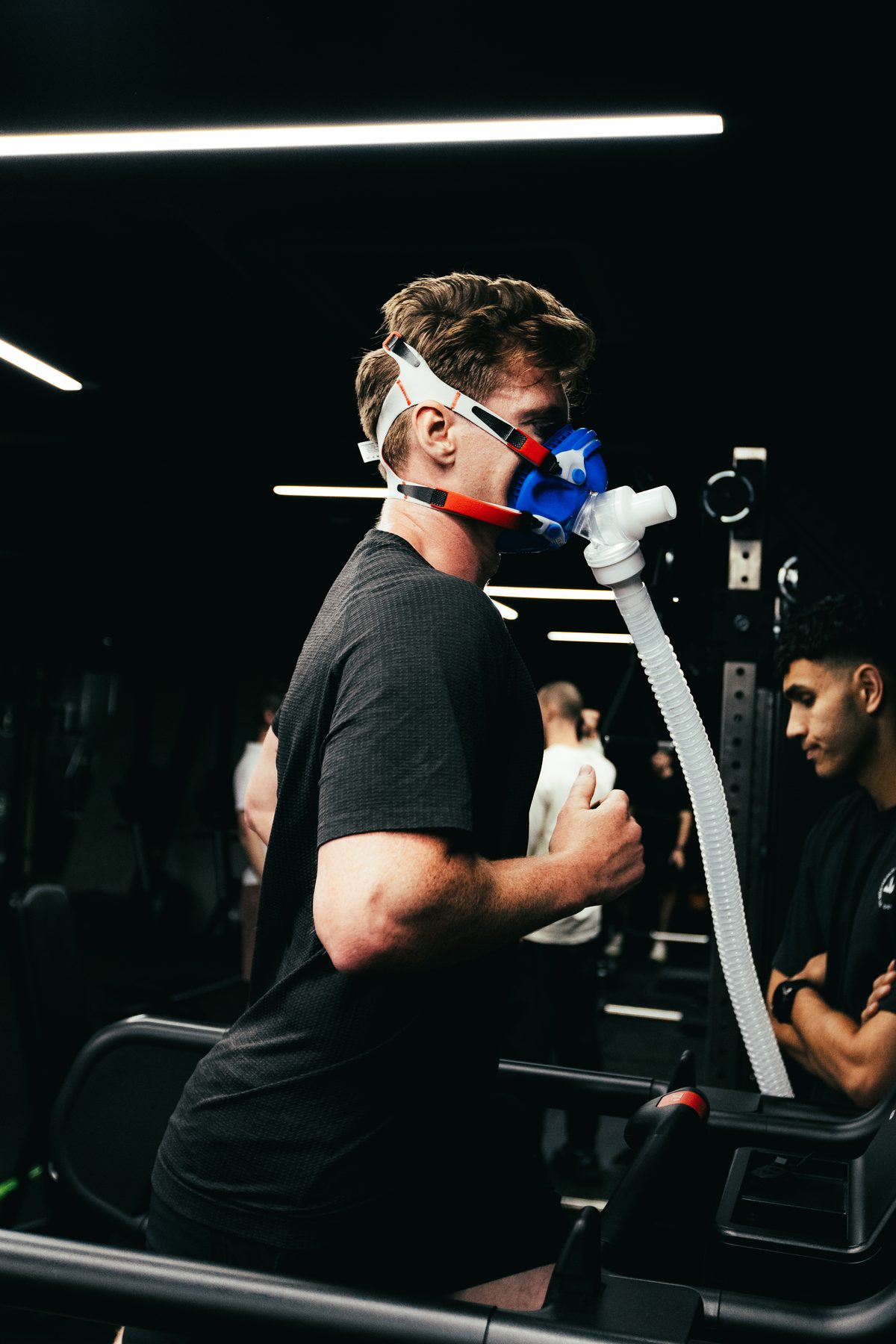 Athlete during a progressive treadmill assessment with blood lactate sampling at DVOTION Labs London